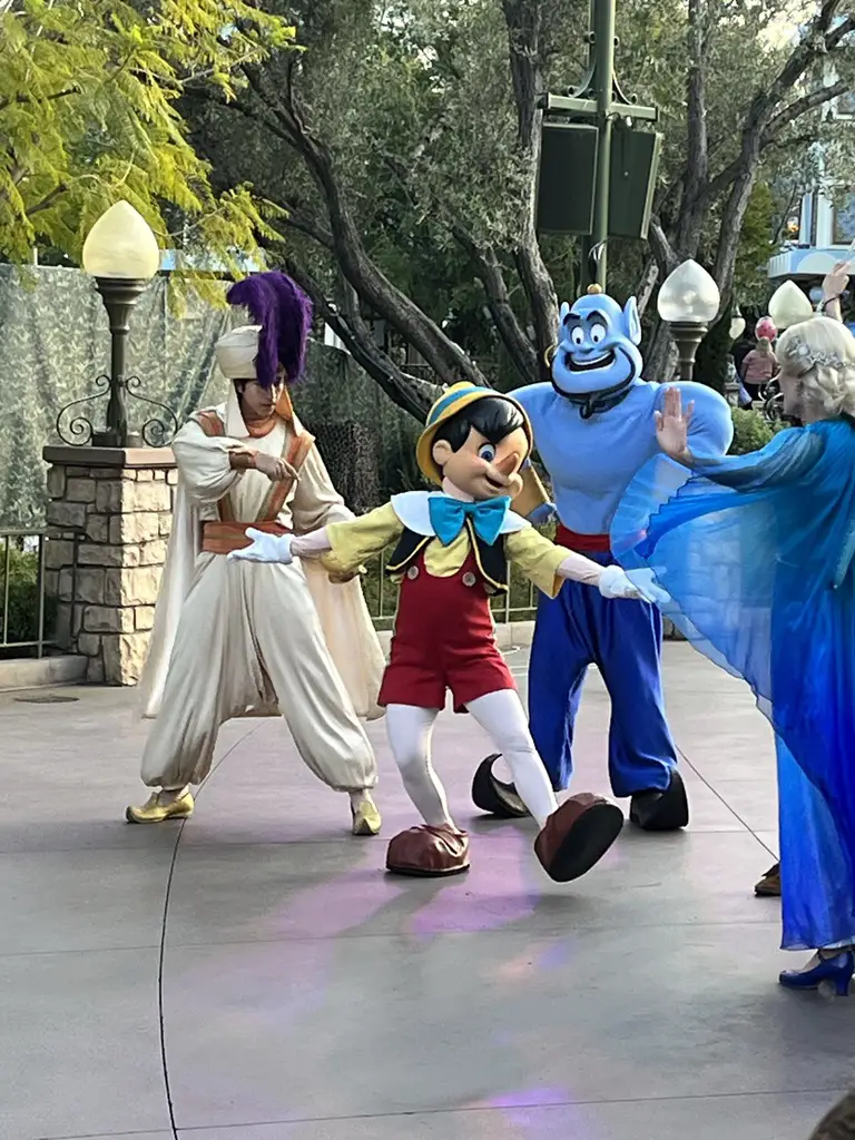 Pinocchio, Aladdin and Genie at Disneyland