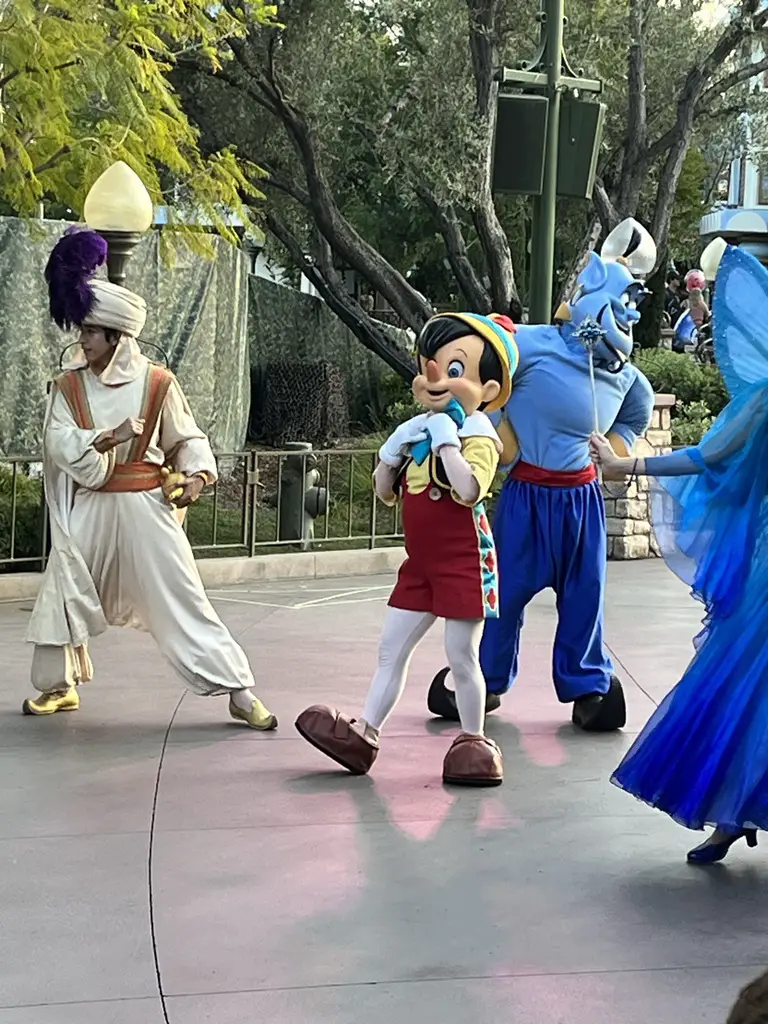 Pinocchio, Aladdin and Genie at Disneyland