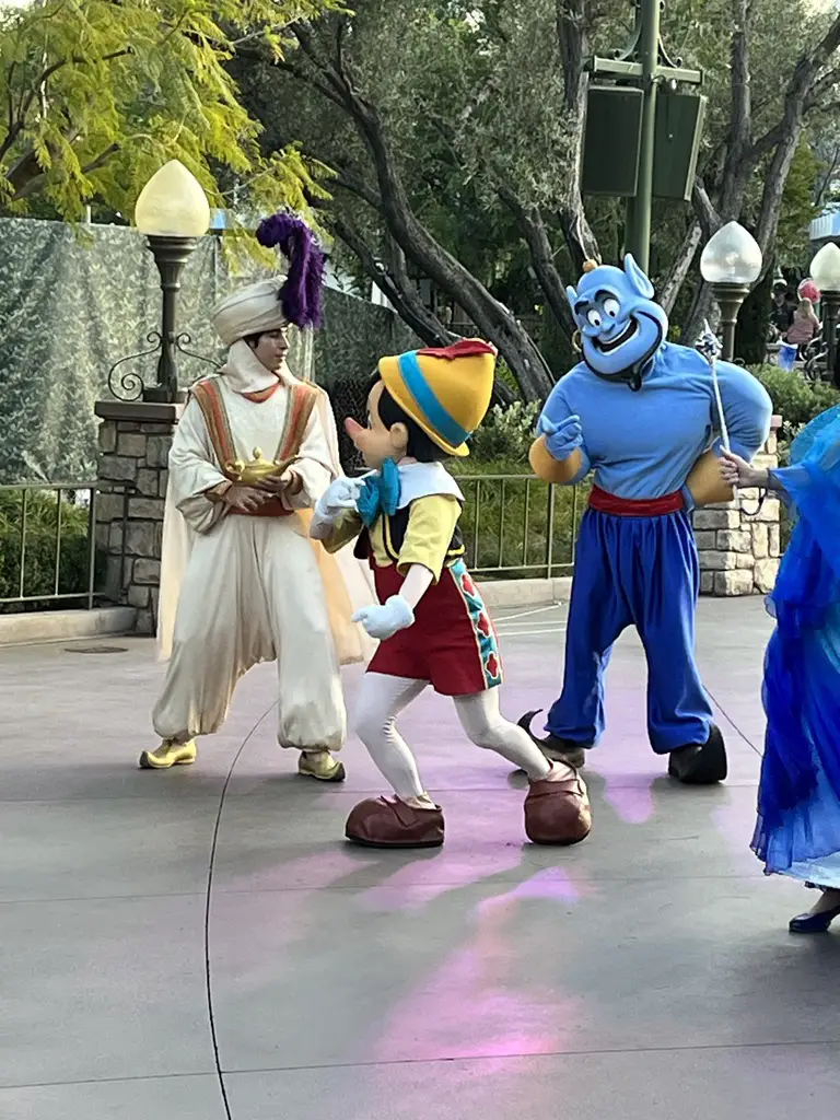 Pinocchio, Aladdin and Genie at Disneyland