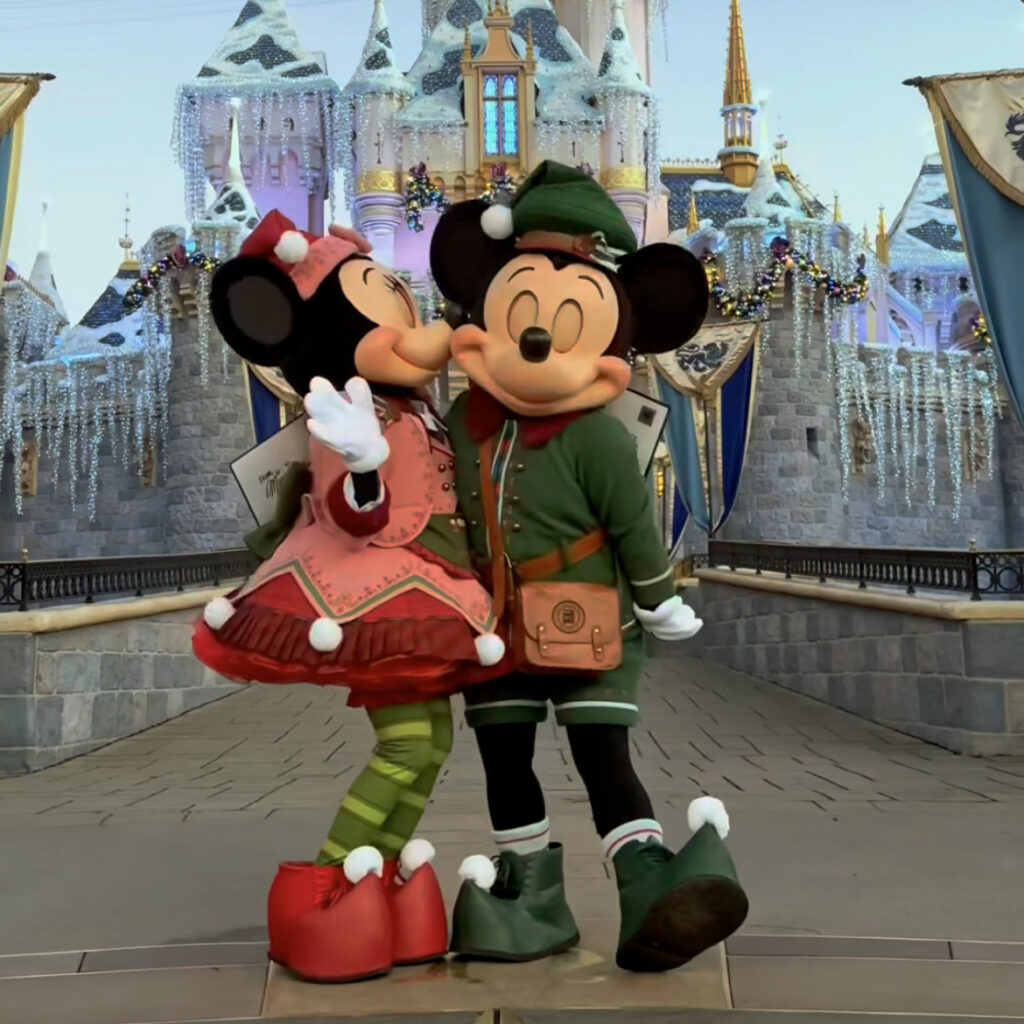 Sneak Peak at Mickey & Minnie Mouse 2024 Holiday Costumes at Disneyland - Sharing a Kiss